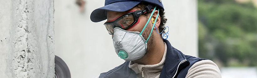 worker wearing prescription safety glasses with straps